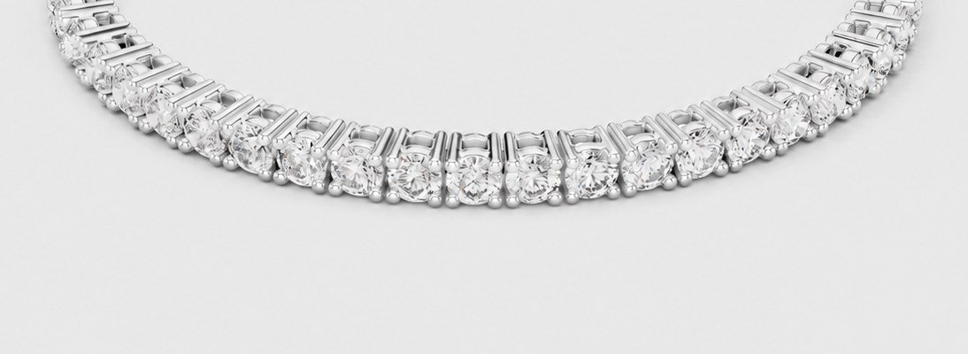 Close view of a diamond tennis bracelet across the wrist