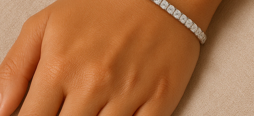 Close view of a diamond tennis bracelet across the wrist