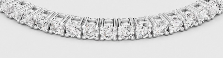 Detail of hand-set diamonds and clasp on a tennis bracelet
